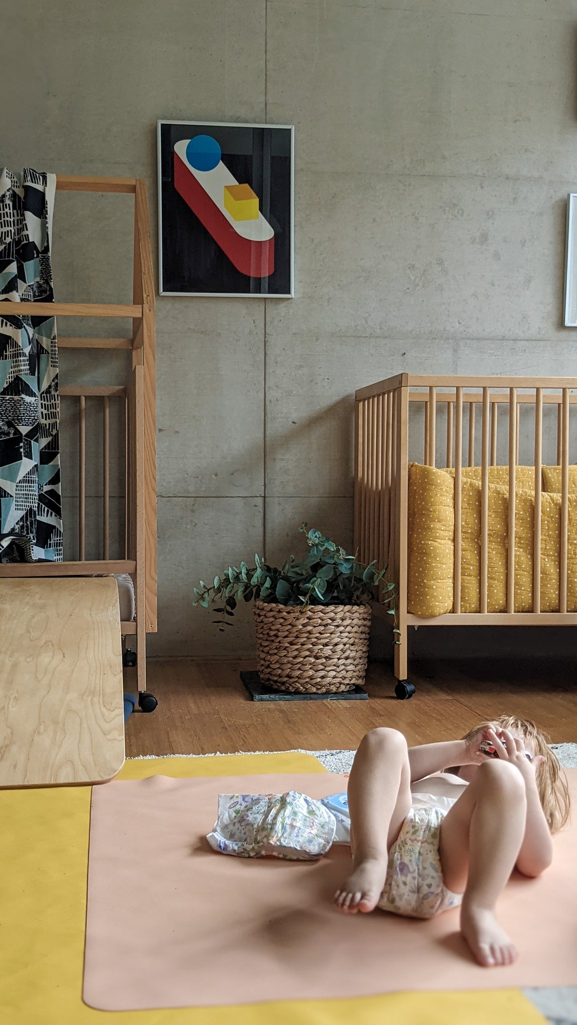 Studio Huske Wriggle silicone mat used as a nappy-free time mat for baby