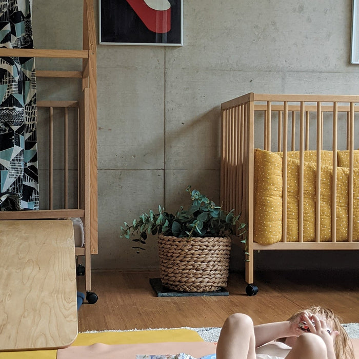 Studio Huske Wriggle silicone mat used as a nappy-free time mat for baby