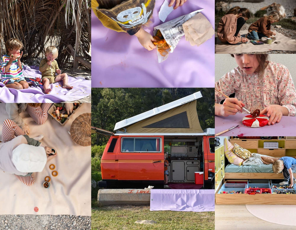 Children playing on large waterproof picnic mats while engaging with colorful toys.