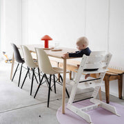 Roam Round Lilac/Red silicone splat mat, the round mat under the high chair in a family dining room