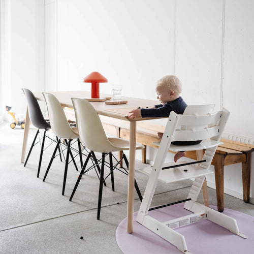 Roam Round Lilac/Red silicone splat mat, the round mat under the high chair in a family dining room