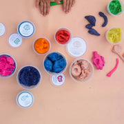Roam Square Peach/Green silicone craft mat, playdough pots laid out overhead