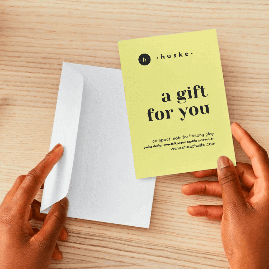 Studio Huske play mat gift card shown as a gifting option for a baby shower or birthday present