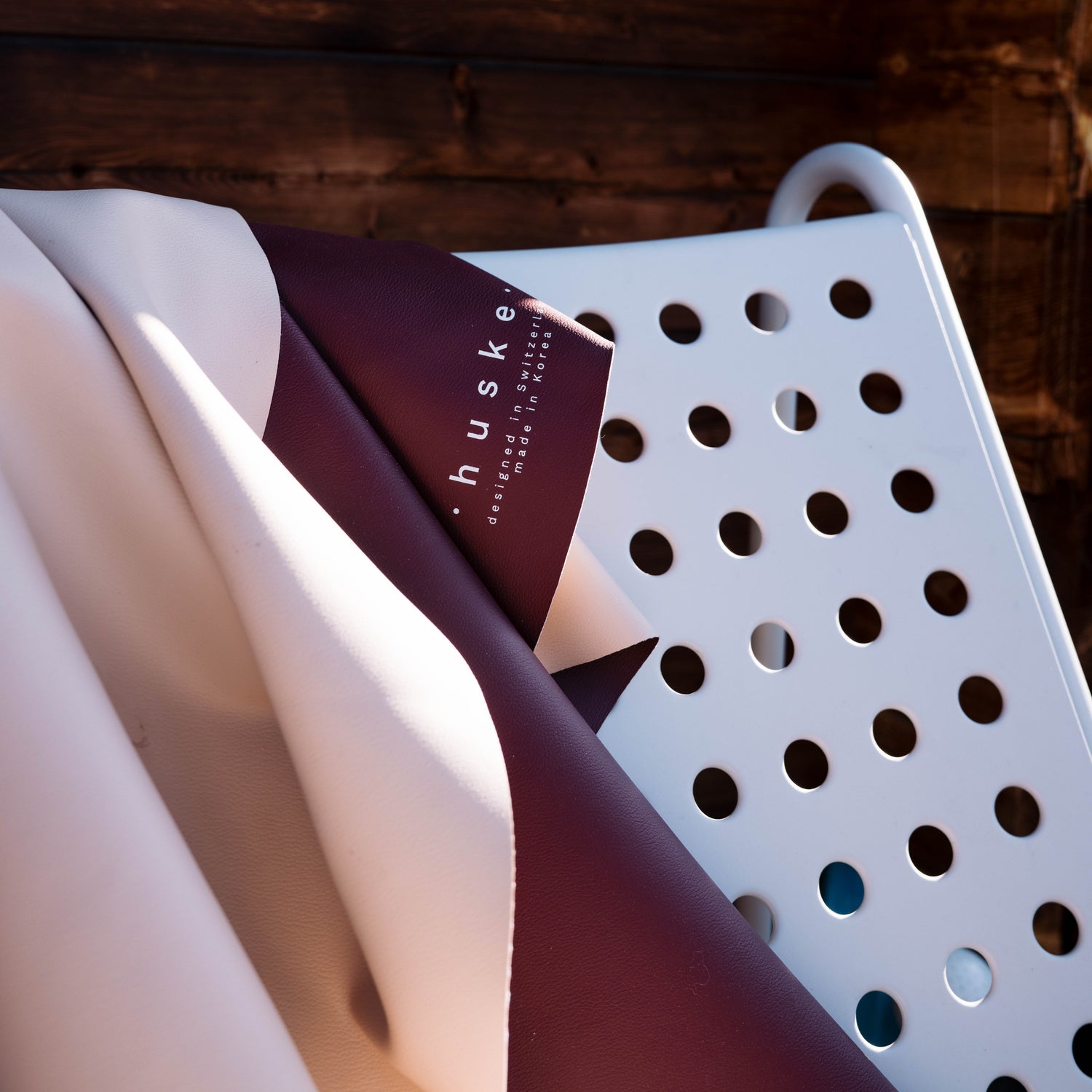 Explore Beige/Wine large round silicone play mat, real silicone leather texture with the wine face folded over