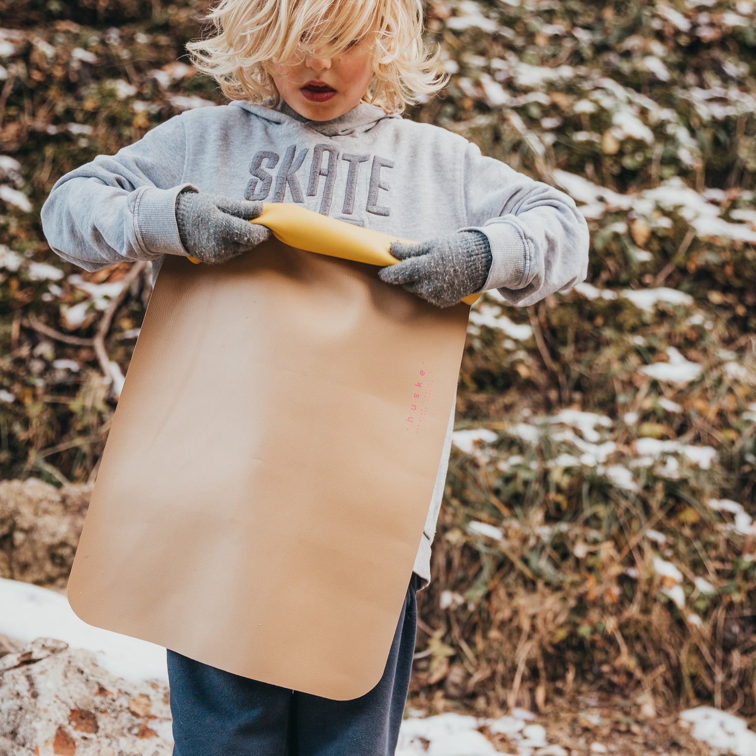 Wriggle Yellow/Mocca silicone changing mat and placemat, children exploring autumn mountain forest landscape