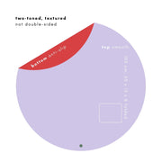 Silicone leather play mat design, two-toned, featuring textured anti-slip bottom and smooth top, round Roam Mat dimensions.