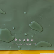 Silicone leather play mat with water droplets, featuring minimalist design and smooth surface for easy cleaning.