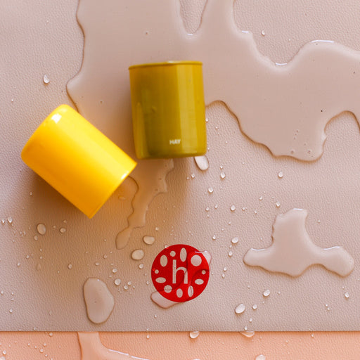 Extra large waterproof silicone mat with colorful cups and water droplets, perfect for family picnics and creative play.