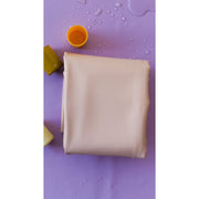 Extra large waterproof silicone mat on a purple surface, ideal for family picnics and play.