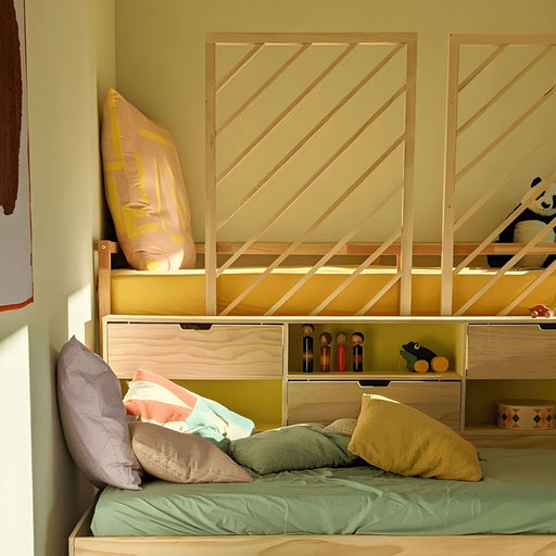 Ikea Kura bed hack DIY plans showcasing a transformed bunk bed with colorful cushions and playful decor.